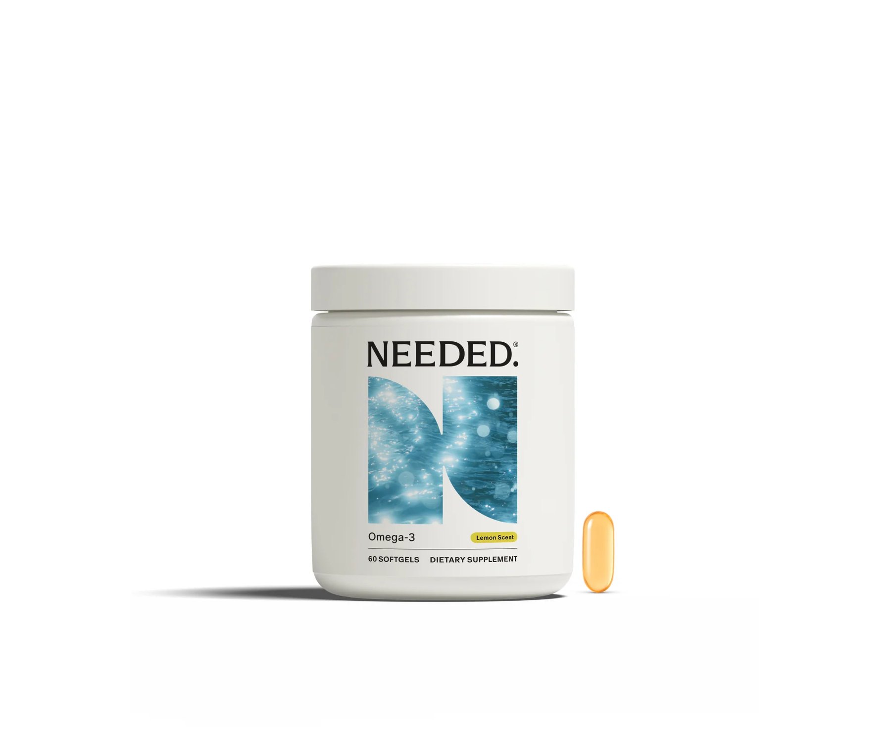 White Needed bottle beside a yellow capsule.