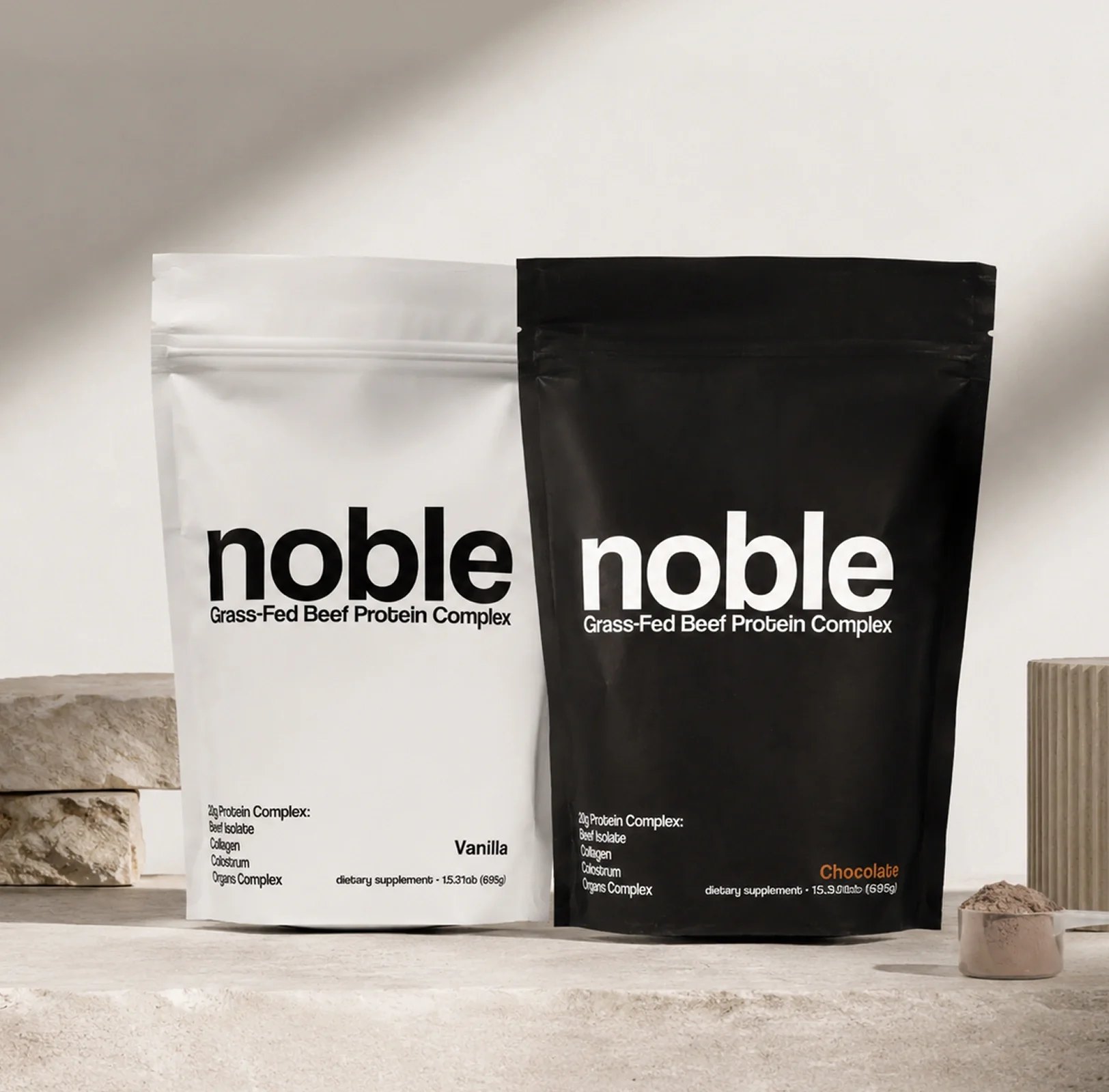 Noble protein complex pouches displayed on stone surface.