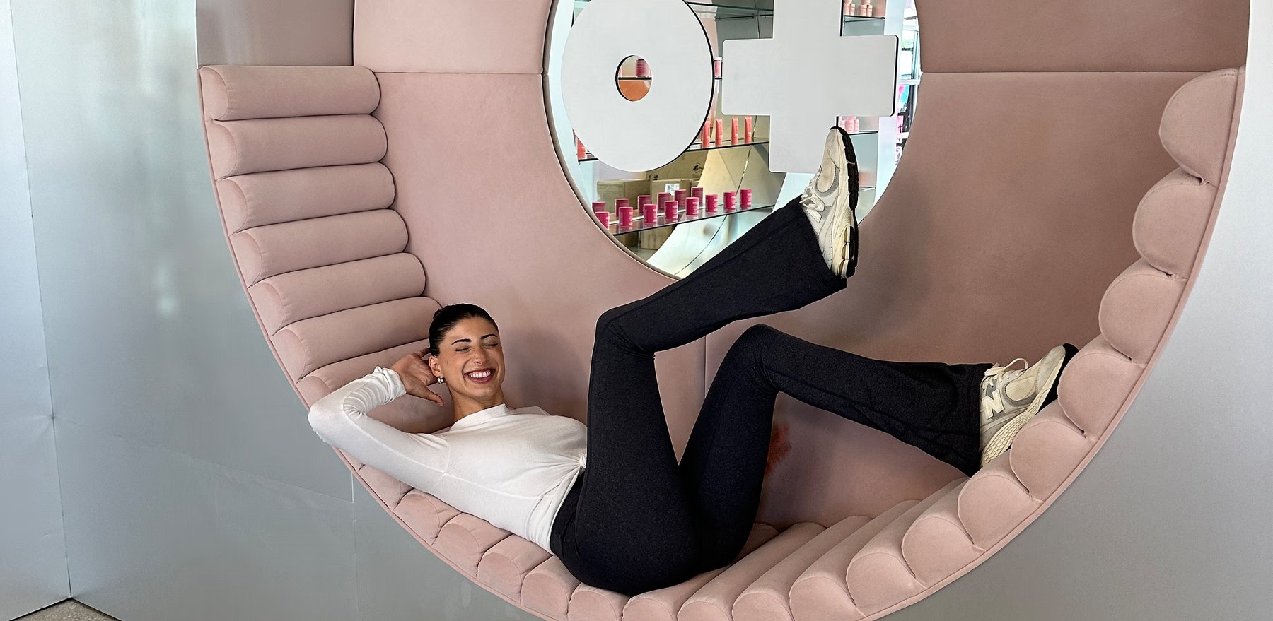 Co founder Brianna Bitton poses inside a pink O Positiv display.