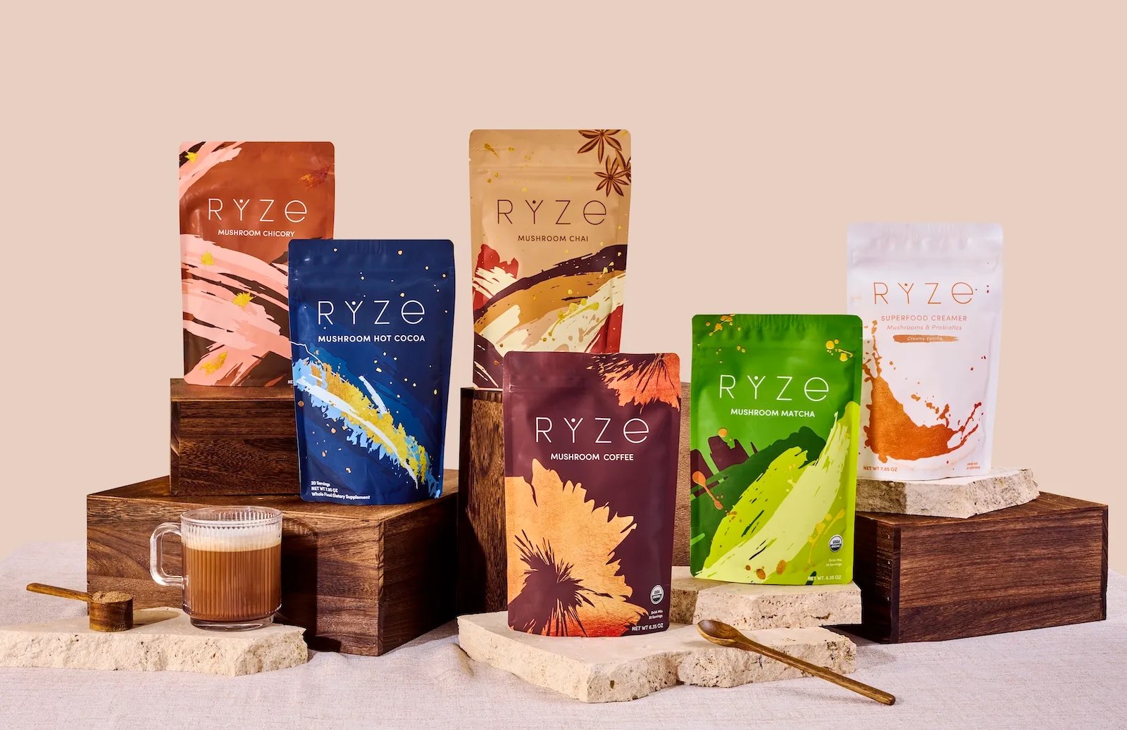 Six RYZE products displayed with a glass mug of coffee.